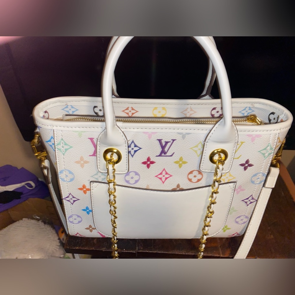 Authentic Louis Vuitton. White with colorful markings